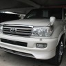 Накладка на передний бампер (сток) Toyota Land Cruiser 100 купить недорого с доставкой в Тобольск