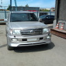 Накладка на передний бампер (сток) Toyota Land Cruiser 100 купить недорого с доставкой в Тобольск