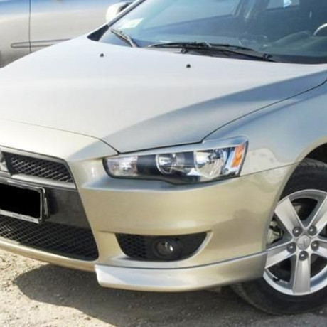 Клыки переднего бампера "Реплика" для Mitsubishi Lancer X купить недорого с доставкой в Тобольск